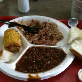 Pulled pork plate, baked beans and fried corn