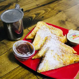 a plate of pastries and a cup of coffee