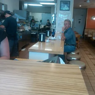 Counter, grill, and prep area.