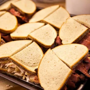 a tray of sandwiches