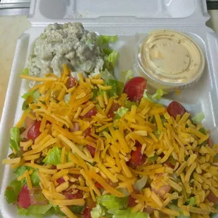 Garden salad with homemade chicken salad.