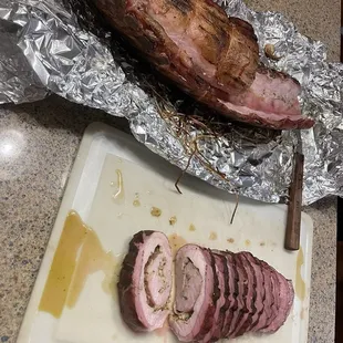 Thanks Jay for cutting a bone in Pork Loin made into Pork Pesto with prosciutto and Parmesan cheese rolled and tied