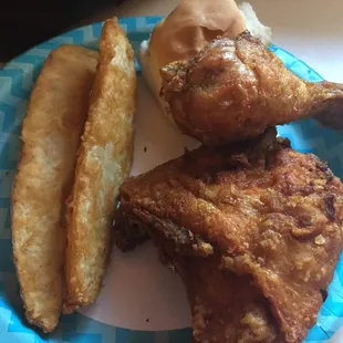 a plate of fried chicken and french fries