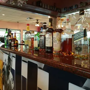 bottles of alcohol on a bar