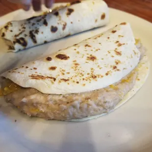 two burritos on a plate