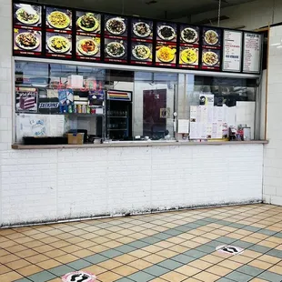 the inside of a sub shop