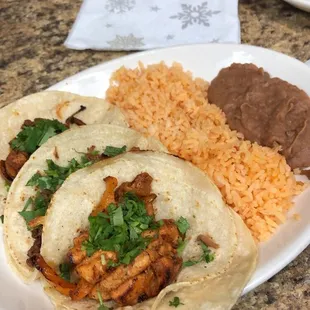 Three tacos combo with rice and beans