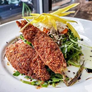 a plate of fried fish