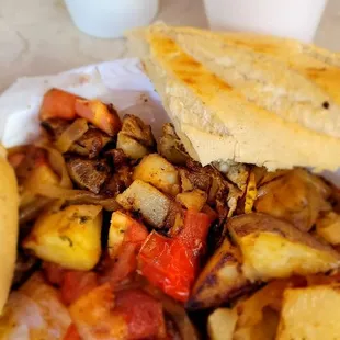 Best house potatoes in the Aventura Area! Breakfast with café con leche and fresh, squeezed OJ.