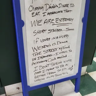 a sign in a restaurant
