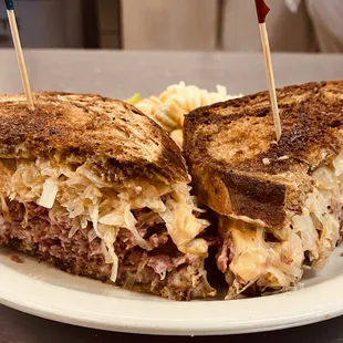 a cut in half sandwich on a plate