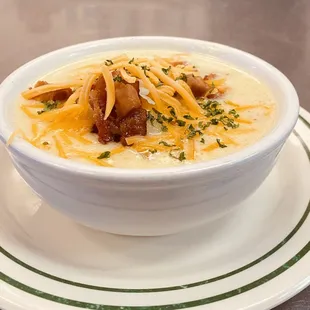 a bowl of soup on a plate