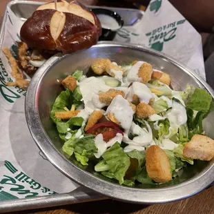 Brisket sandwich on pretzel roll. 3 out of 4 of us ordered it and they all loved it.