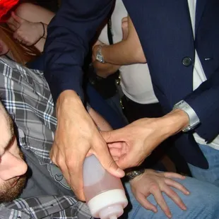 Squeeze bottle of Absolut Citron &amp; Tropicana grapefruit juice.