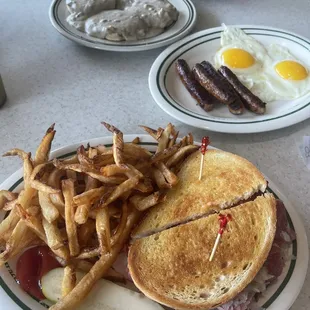 Reuben and biscuit and gravy with side of sausage and eggs.