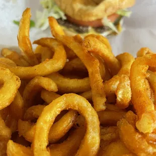 Lunch: a baby and curly fries!