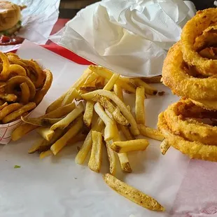 Curly fries, regular fries and onion rings