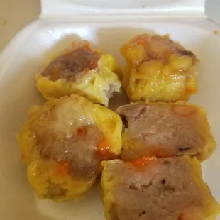 Interior view of Siu Mai: Gummy wrapper; ok porky fulling; overly, way too sweet vinegar sauce that ruined the meatiness. :-(