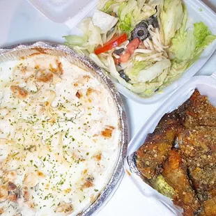 Chicken Alfredo and breadstick, salad, and hot garlic parmesan wings.