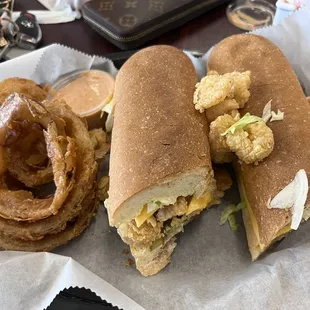 Shrimp Poboy (added cheese) with onion rings