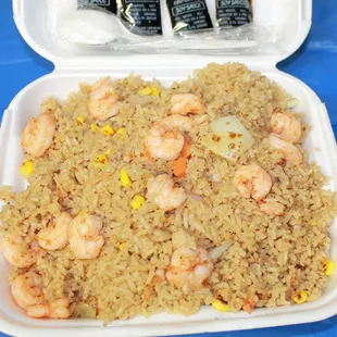 Shrimp fried rice. Always made hot and fresh. made with corn, carrots and onions.
