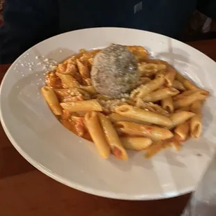 Penne and Vodka sauce with a meatball.