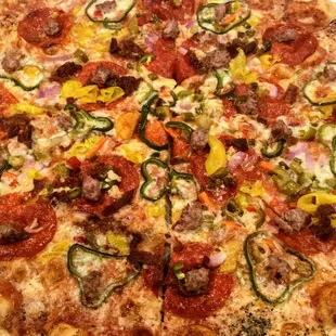 INFERNO - 9 levels of Hell! Poblano, pepperoni, giardiniera, bacon, fresh garlic, jalapeno, sausage, red onion, banana pepper