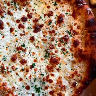 a cheese pizza on a table