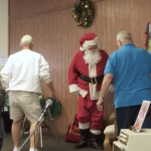 Prepping Santa Claus for photo shoot! LOL :p