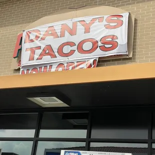 a sign on the front of a restaurant