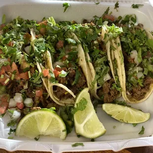 Bistec street tacos on corn tortillas