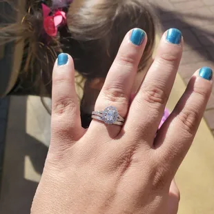 Engagement ring purchased here at Danz! This photo is right after I picked them up from being cleaned and repaired