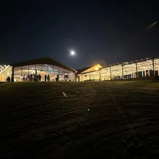 Walking down the meadow, looking at the outdoor portion for outdoor seating for wine and apps.