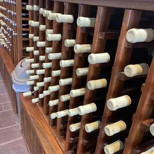 a row of wooden wine racks