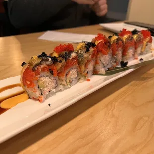 Las Vegas roll: california roll with spicy tuna and fried unagi on the outside