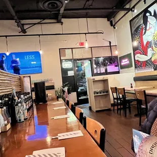 a woman reading a menu