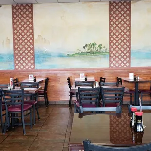 Dining area with classic wall art