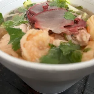 House wonton soup. $11 looks small but is packed with meats and veggies. Chicken pork shrimp