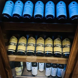Various wine selections including Daou