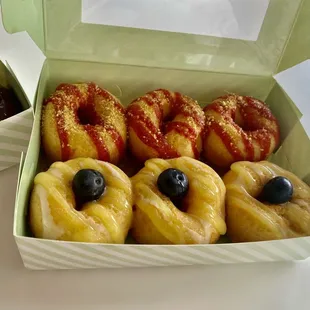 Blueberry lemon and strawberry glaze donut