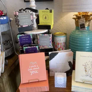 a table with books and a lamp