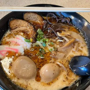 Kuro tonkotsu with 2 aji tama eggs on the side, not cut in half because I like to bite through them.