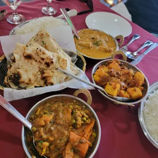 Garlic Naan and some of our shared entrees. The favorites were in order from top of pic, bottom of pic, middle of pic