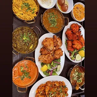 a table full of indian food