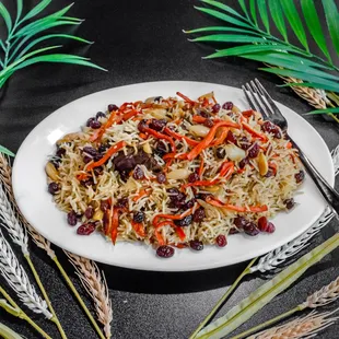 Afghani Kabuli Palaw, With Lamp meat and raisin and carrots and almonds .