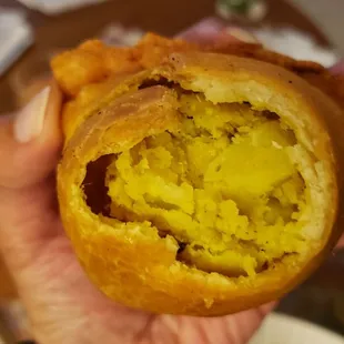 Interior of vegetable samosa ($5), vegan by default. Bland interior filling.