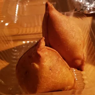 Vegetable samosa ($5), vegan by default. Interior filling is bland.