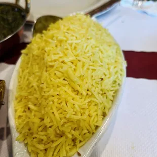 a plate of yellow rice