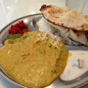 I took this photo after spilling the rice into the lentils and taking a bite of naan. Oops.