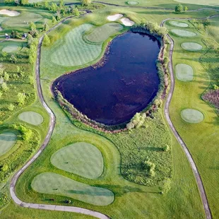 Hole #11 - 194 yds all carry from the tips if you dare!  Don't worry if your ball can't swim, it won't be lonely!